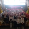 Uczniowie_klasy_1c_wykonuja_piesn_patriotyczna